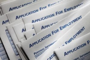 Stack of employment application forms